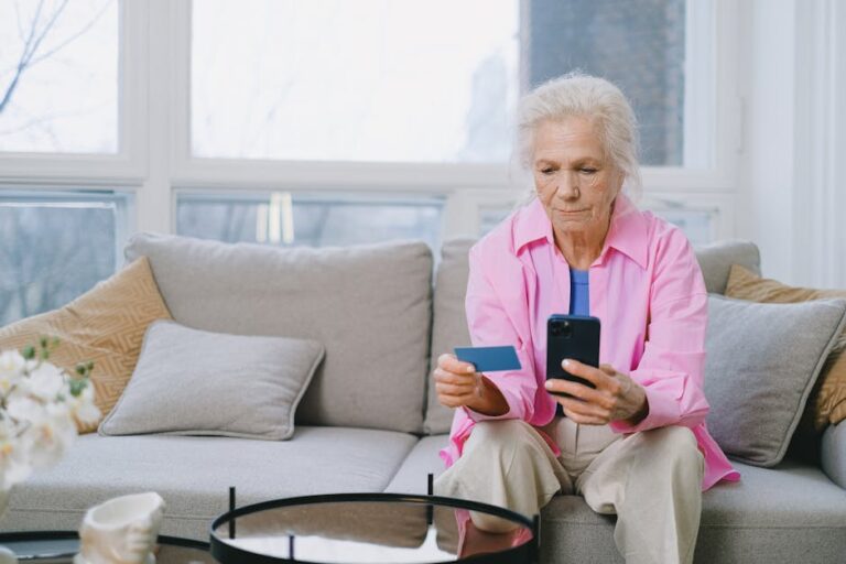 senior using technology home comfortable - Photo by SHVETS production on Pexels