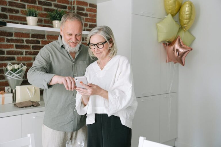 elderly couple technology home smiling - Photo by Ivan S on Pexels