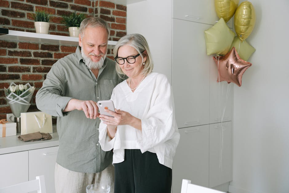 elderly couple technology home smiling - Photo by Ivan S on Pexels